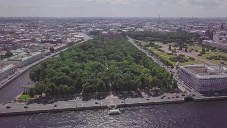 Saint-Petersburg,-an-aerial-drone-footage-of-central-park-Summer-Garden,-boats-in-a-river,-channel,-Church-of-Savior-on-Blood,-Castle,-center-of-Saint-Petersburg