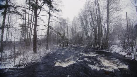 Winter-dark-blue-river-in-slow-motion-with-waves