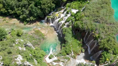 Birds-view-drone-shot-of-waterfalls-in-the-forest