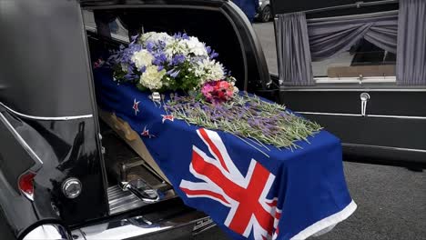 closeup-shot-of-a-funeral-casket-in-a-hearse-or-chapel-or-burial-at-cemetery