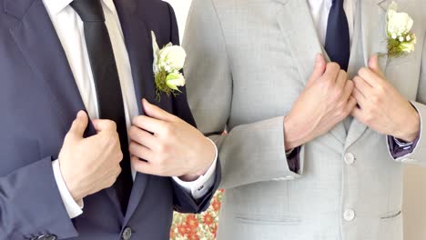 shot-of-wedding-suits,-tie,-socks,-shoes---watches-for-the-groom---groom-men