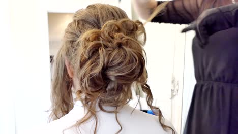 shot-of-bride-beautiful-hair-do-before-a-wedding