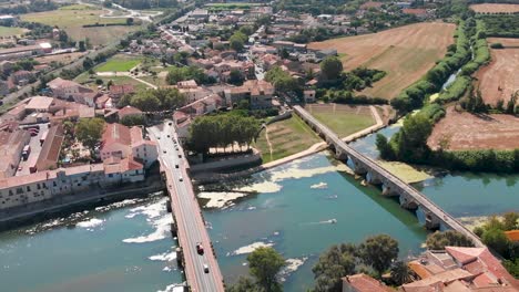 Bird's-eye-view-of-a-south-French-town-with-bridges-over-a-river