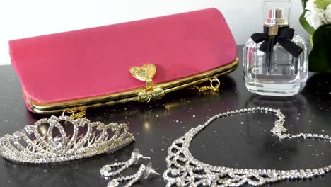 closeup-shot-of-woman-purse,-handbag,-necklace,-ear-ring-and-wedding-accessories