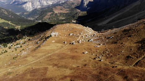 Drone-shot-of-valley-in-the-Italian-Dolomite-mountain-region