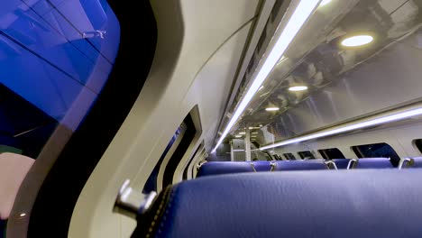 Interior-of-a-moving-and-almost-empty-dutch-train