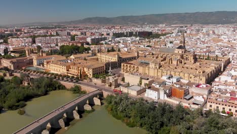 Aerial-overview-of-old-Spanish-city-with-stone-bridge