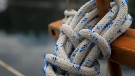 Slider-shot-of-bundles-of-rope-on-a-sailboat-deck