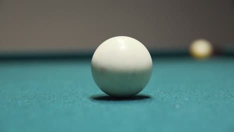 Sinking-the-yellow-9-ball-in-a-game-of-Billiards