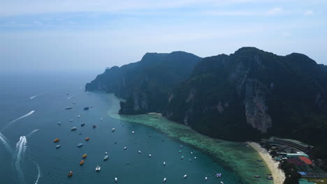 Aerial-footage-of-island-with-crystal-clear-turquoise-water-in-Thailand