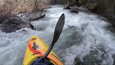 First-person-view-of-whitewater-kayak-on-the-Applegate-River-on-the-border-of-California-and-Oregon