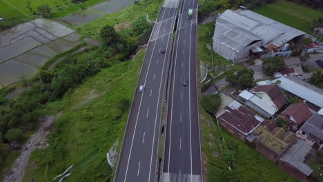 Aerial-view-of-cars-driving-on-a-highway-in-Indonesia