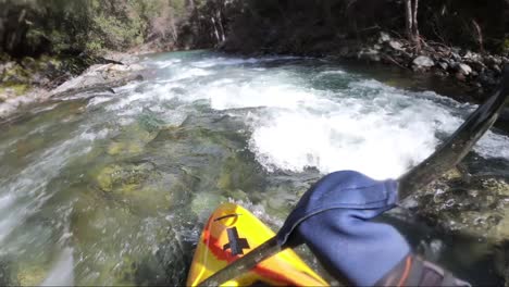 First-person-view-of-whitewater-kayak-on-the-Applegate-River-on-the-border-of-California-and-Oregon