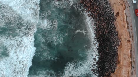 Epic-drone-shot-above-beach-in-San-Diego-in-Southern-California