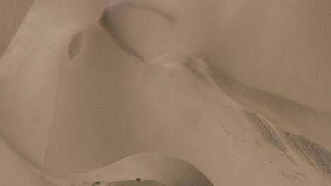 Drone-top-shot-of-dunes-in-a-desert