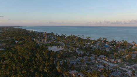 Flying-above-luxury-bungalows-on-exotic-Zanzibar-island-on-sunset