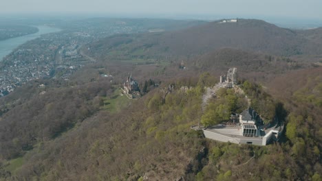 Drone---Aerial-shot-of-the-Drachenfels-with-castle-Drachenburg-and-the-river-rhine-Siebengebirge-near-Bonn---Königswinter-30p