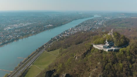 Drone---Aerial-shot-of-the-ruin-Drachenfels-with-castle-Drachenburg-and-the-river-rhine-Siebengebirge-near-Bonn---Königswinter-30p