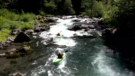 Aerial-view-of-whitewater-kayaker-running-class-IV-rapids-on-the-Mill-Creek-section-of-the-Rogue-River-in-southern-Oregon