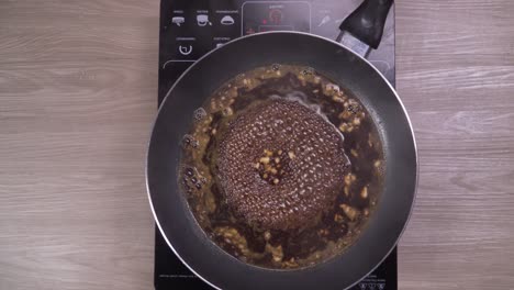 Time-lapse-preparing-homemade-sauce-on-frying-pan,-adding-ingredients