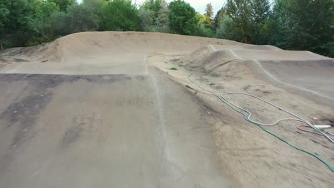 BMX-bike-pump-track-course,-aerial-view