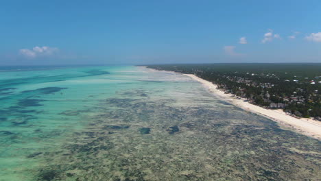 Aerial-view-of-ocean-and-coastline-of-Jambiani-in-Zanzibar-island