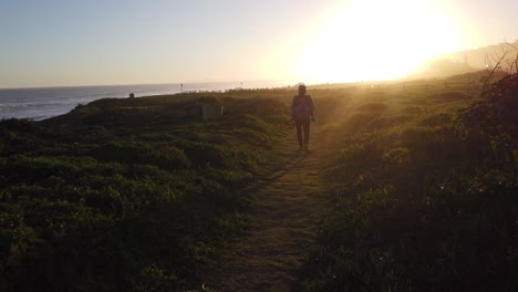 Sunset-walk-next-to-the-ocean