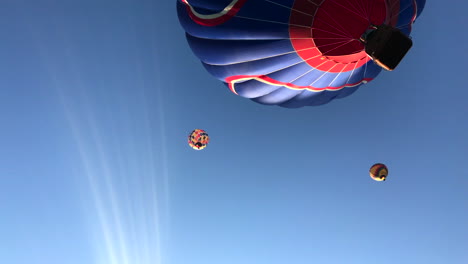 Hot-air-balloon-above-head,-pan