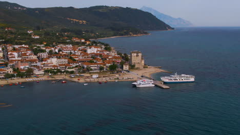 Aerial-footage-of-Ouranoupoli-village-on-the-coastline-in-Athos-in-Halkidiki-during-sunny-day