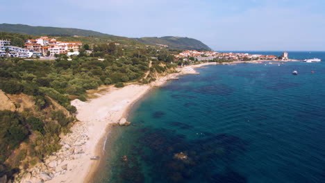 Aerial-footage-of-Ouranoupoli-coastline-in-Athos-in-Halkidiki-during-sunny-day