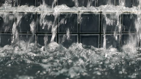 Close-Up-Drops-of-Water-Falling-From-Tile-Step