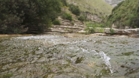 River-stream-flows-in-slow-motion-in-Nature-Reserve-Cavagrande,-Sicily