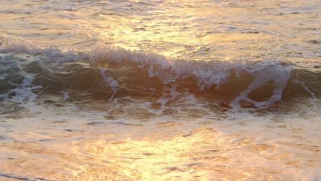 Amazing-Slowmotion-sunset-over-the-tropical-beach-Durban,-Kwazulu-Natal,-Waves-on-the-beach-at-dawn,-Morning-at-sea,-sunrise-on-the-sea-beach,-orange-sunlight