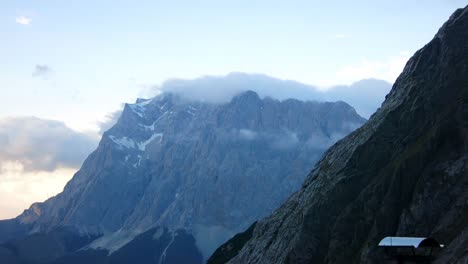 Close-view-of-moutain-peak-Zugspitze-covered-in-clouds