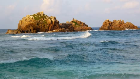 Waves-crashing-against-giant-rock-on-African-shoreline-during-storm
