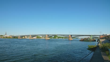 Panorama-shot-of-the-Theodor-Heuss-Brücke-bridge-between-mainz-and-wiesbaden,-Hesse-and-rhineland-palatinate-with-the-river-rhine-on-a-sunny-summer-day