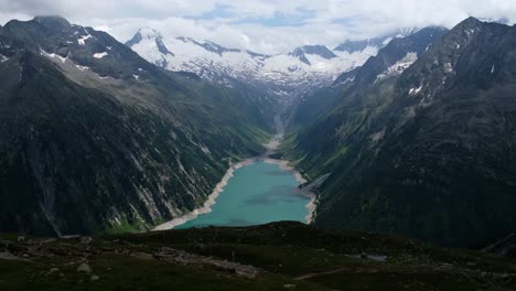 Aerial-timelapse-of-hydroelectric-power-station-lake-Schlegeisseen-in-austrian-alps