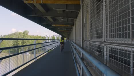 Biking-over-danube-river-in-Vienna-city-on-a-hot-summer-day
