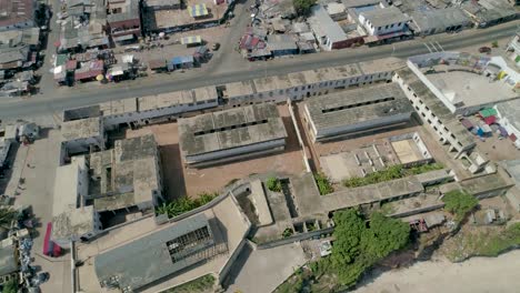 Ussher-Fort,-Accra-top-to-side-aerial-view-in-60fps