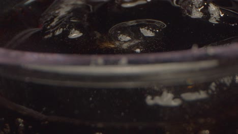 Close-up-ice-and-cola-in-glass
