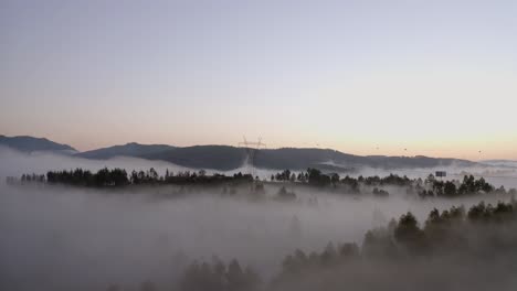 Thick-Fogs-Over-Mountain-Forest-At-Sunrise-In-Portugal