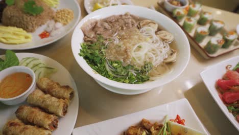 Restaurant's-Table-Full-Of-Delicious-Vietnamese-Specialty-Dish