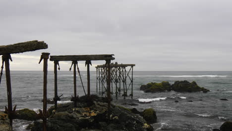 Ruins-of-the-historic,-120-year-old-pier-in-Llico,-Vichuquen,-Chile,-scenic-shot