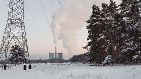 Thick-white-steam-coming-from-german-gas-power-plant-Franken-1-in-Nuremberg-during-snowy-winter-day