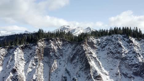 Slow-reveal-of-snow-covered-coastal-mountains,-Whistler