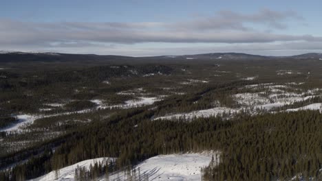 Aerial-view-drone-shot-winter-landscape-in-the-northern-parts-of-Sweden