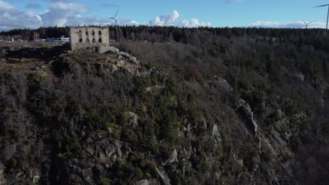 Fast-Drone-flight-near-Ruins-of-castle-in-JÃ¶nkÃ¶ping,-Sweden