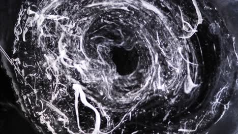 From-deep-in-a-dark-tunnel-white-wisps-drift-up-and-up-and-up---an-all-natural-AbstractVideoClip