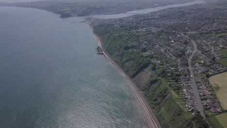 Teignmouth-rail-line-along-coast-high-angle-showing-town-and-river-in-background