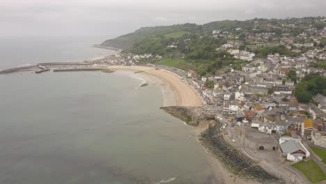 High-angle-overview-of-Lyme-Regis-beach-and-town